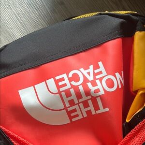 North face duffel multi color way